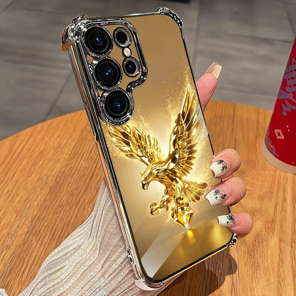 Gold eagle design phone case from Corporación Turística, featuring a shiny, decorative eagle pattern on a protective mobile cover.