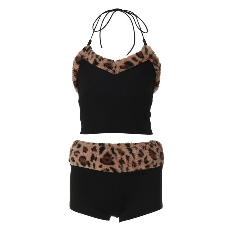 Two-piece matching set featuring a stylish sling from Corporación Turística, ideal for casual or beachwear, shown on a model.