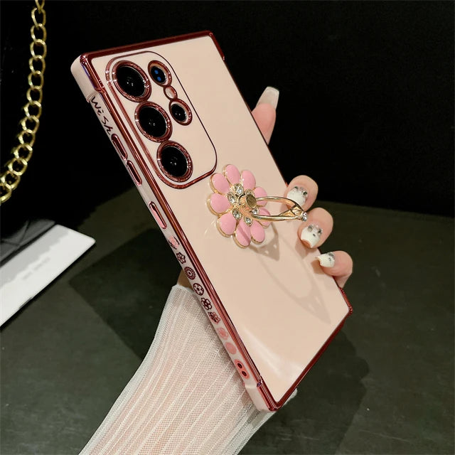 Luxury gold-plated ring case for Samsung Galaxy S24 Ultra, featuring a stylish metallic frame and protective design.