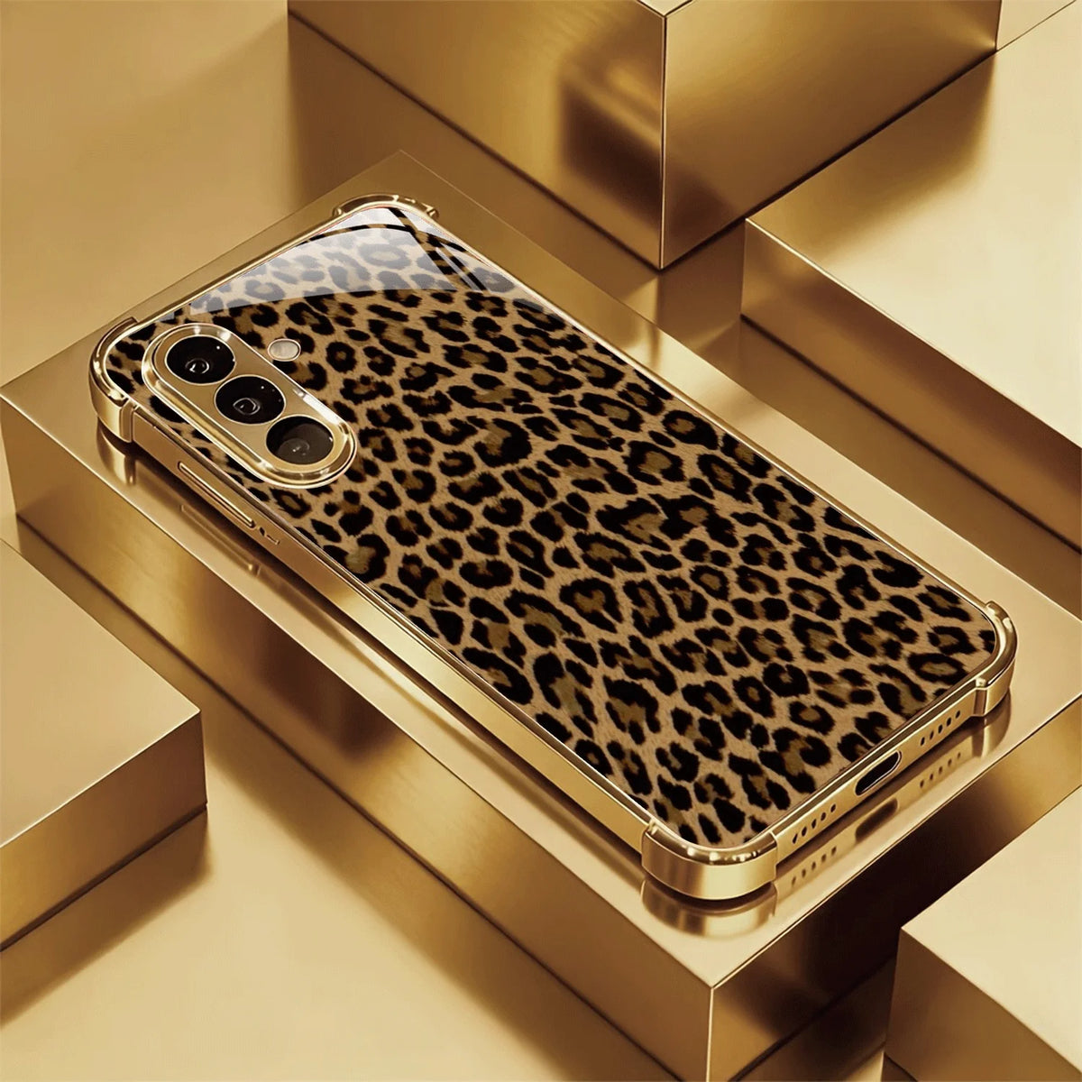 Gold-plated glass phone case with elegant design by Corporación Turística, showcasing a sleek and reflective surface.