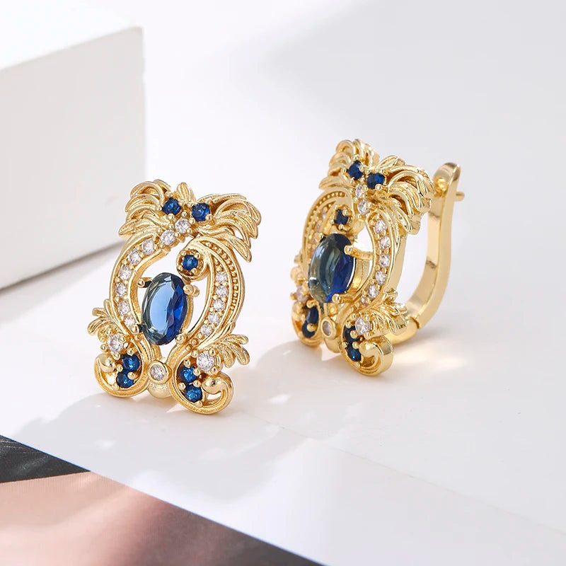Elegant blue cubic zirconia earrings from Corporación Turística, showcasing sparkling, luxurious jewelry with intricate design details.