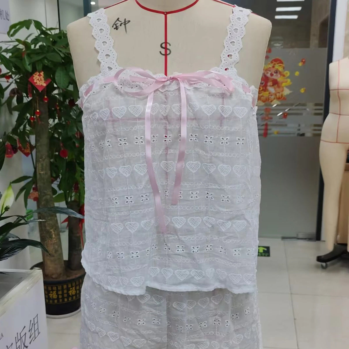 Elegant embroidered women's pajama set from Corporación Turística, featuring comfortable, stylish sleepwear for women.