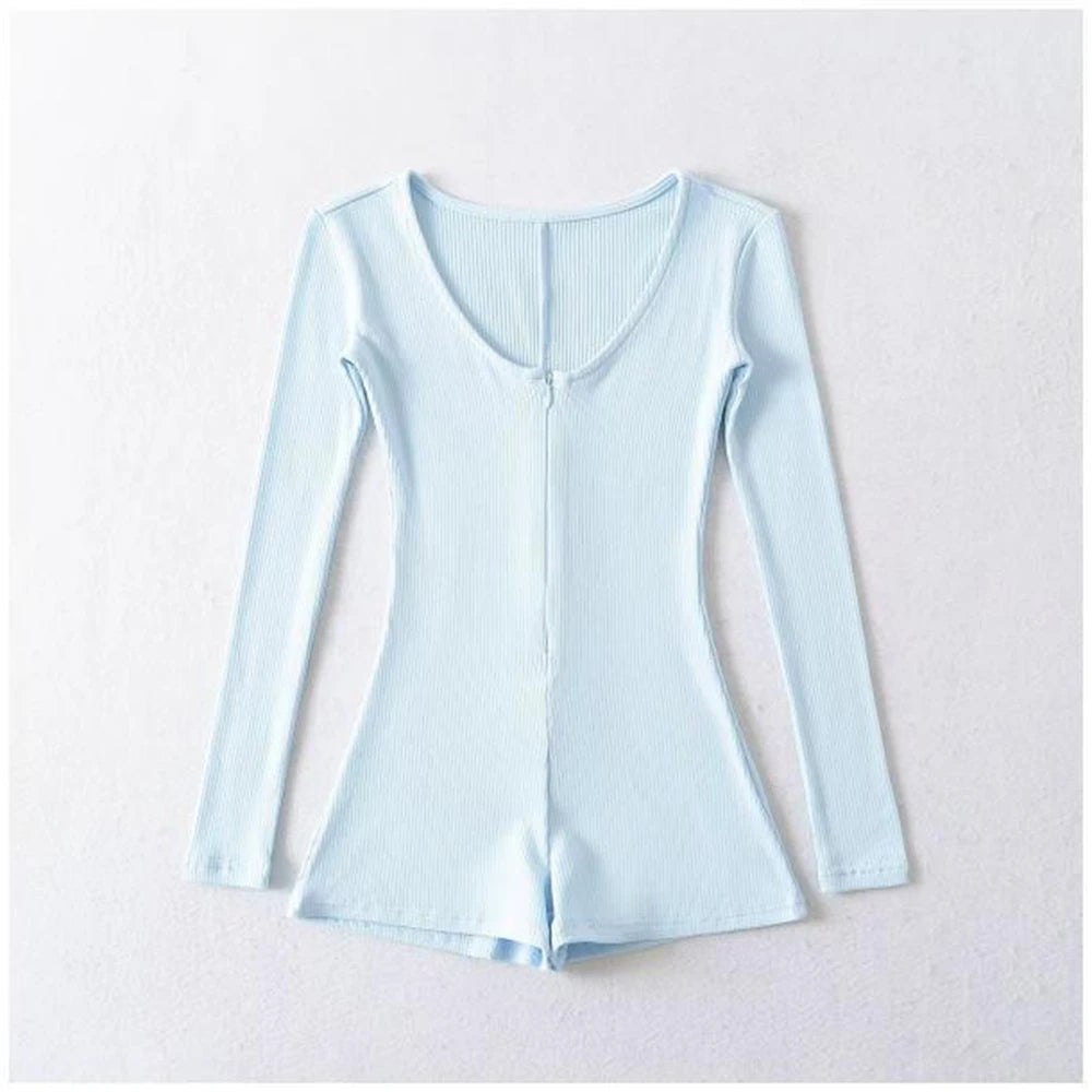 Elastic women's yoga jumpsuit by Corporación Turística, fitted and comfortable for active wear and yoga practice.