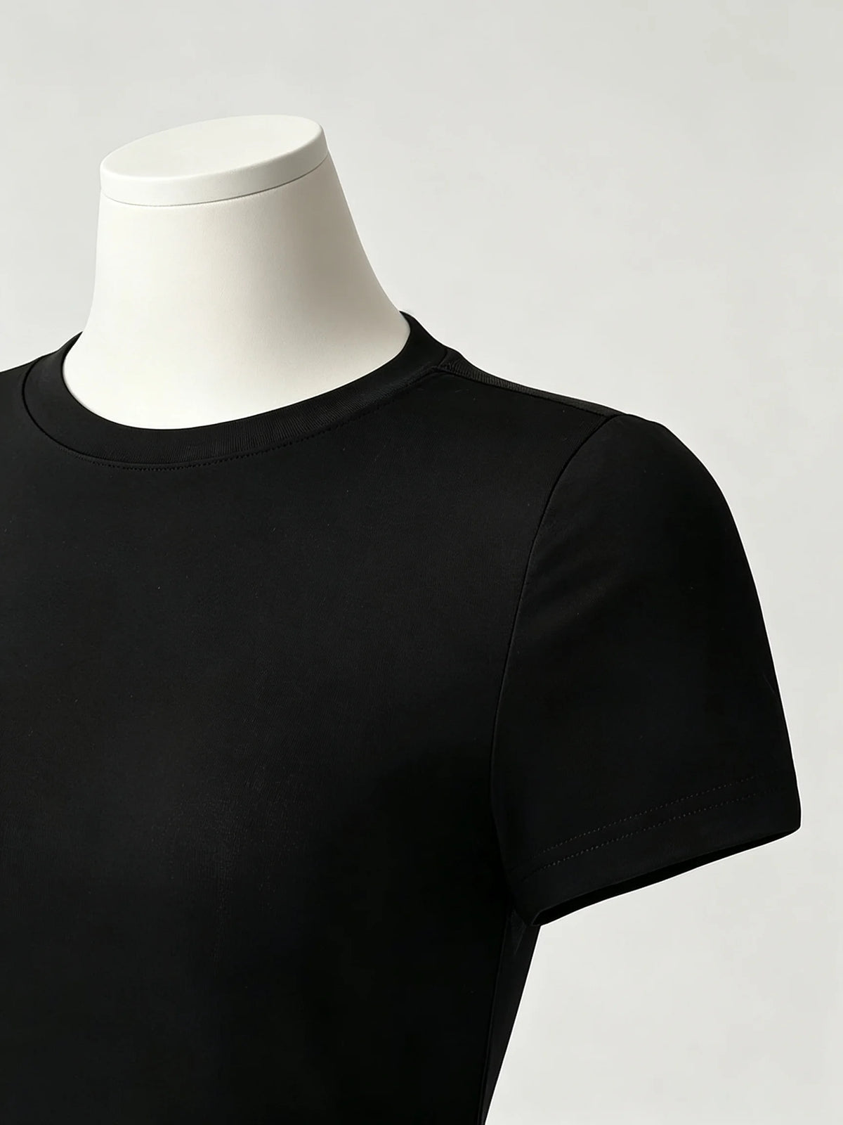 Short sleeve women's body with transparent mesh back, stylish and comfortable, from Corporación Turística.