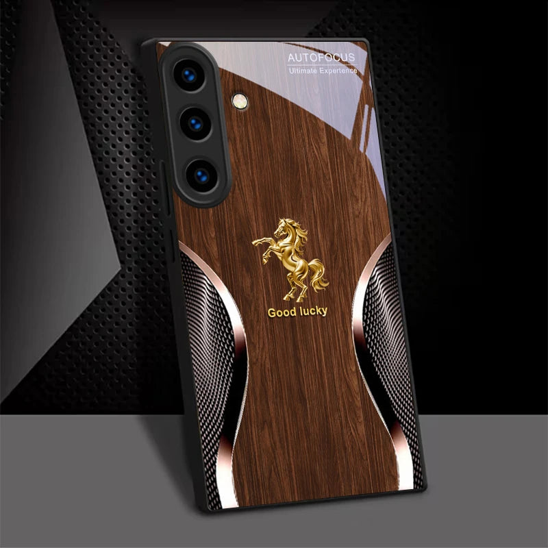 Black crystal phone case with gold steed design by Corporación Turística, featuring elegant and protective accessory for mobile phones.