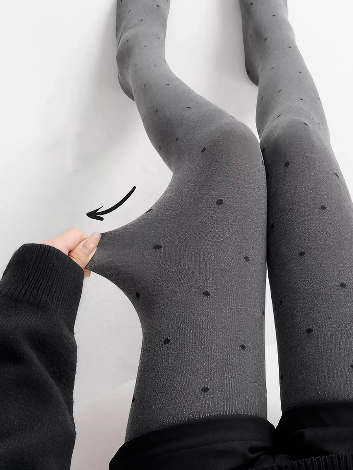 Gray vintage knit tights with small polka dots from Corporación Turística, featuring a textured, classic design.