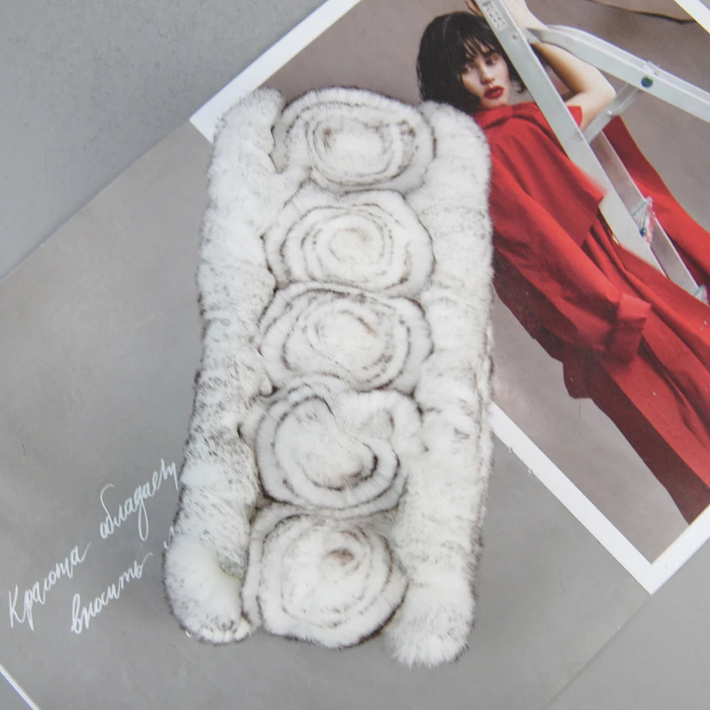 Authentic leather hats and matching scarves from Nueva moda, displayed in a stylish set by Corporación Turística.