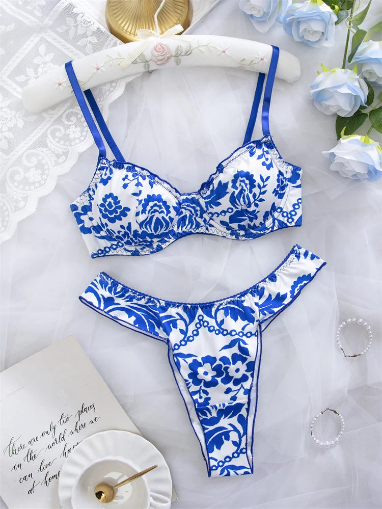 Blue floral print women's lingerie set with matching bra and panties, featuring delicate lace details and soft fabric.