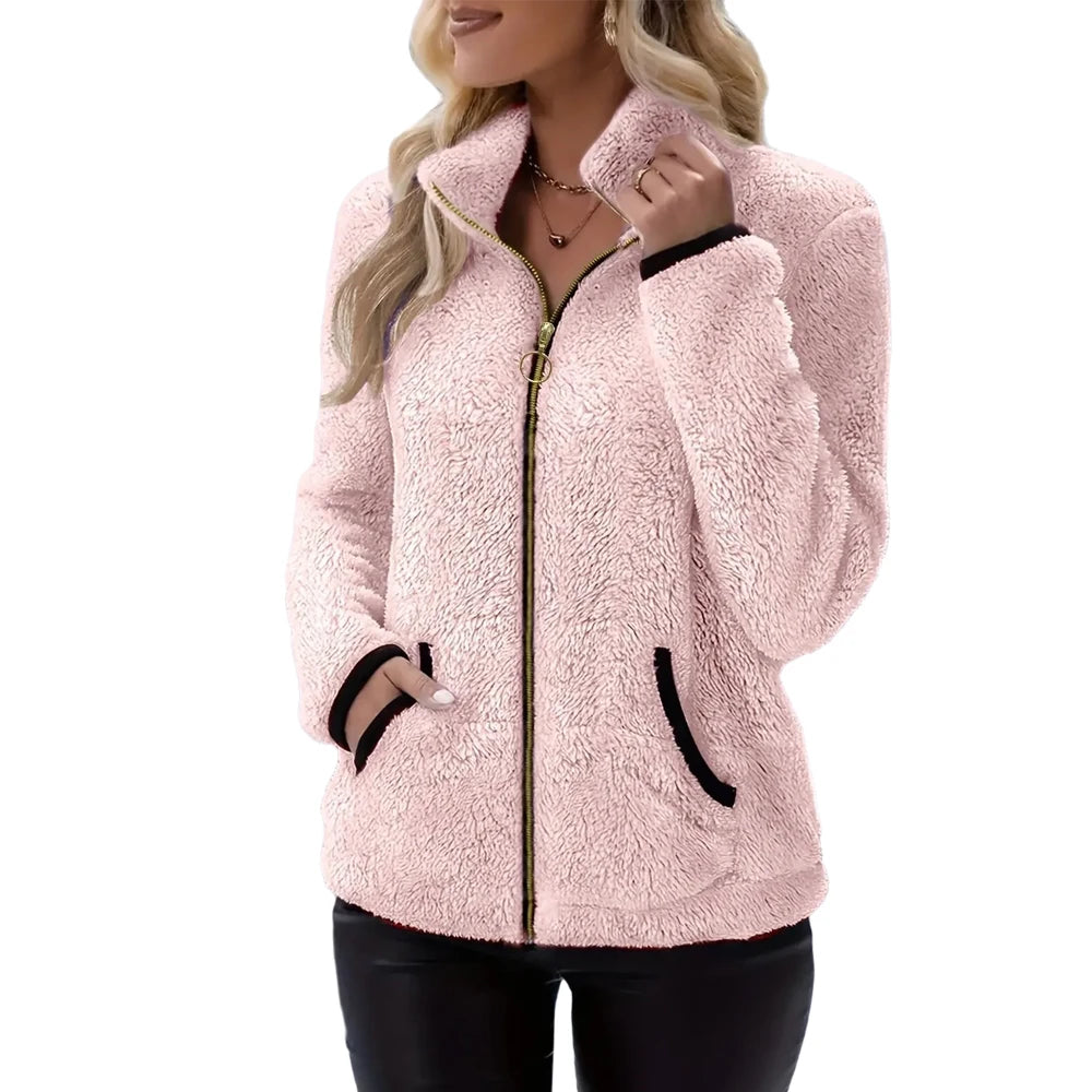 Women’s full-zip fleece jacket by Corporación Turística, featuring a cozy design and front zipper closure.
