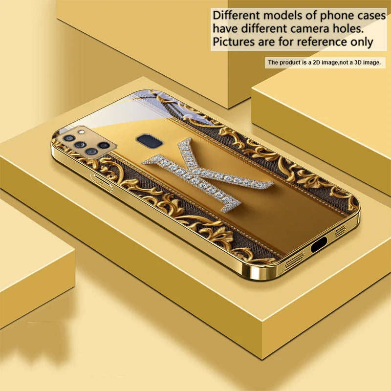 Golden crystal phone case with diamond embellishments, designed for a stylish and luxurious look.