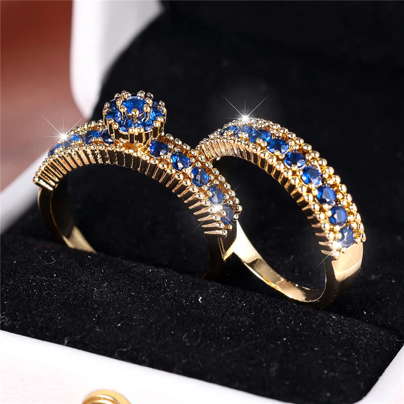 Conjunto de anillos de compromiso de piedra de circón azu...