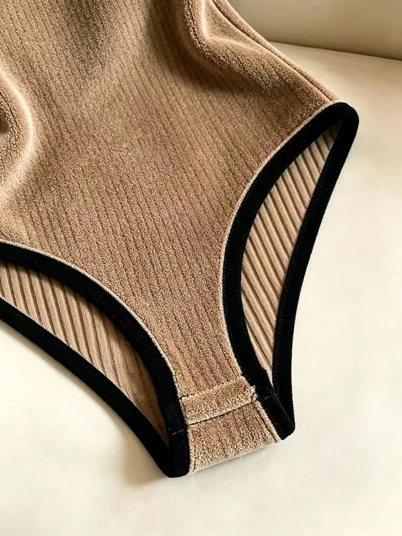 Women's ribbed sleeveless knit body from Corporación Turística, featuring a fitted design and back closure.
