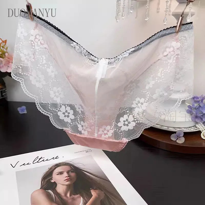 Set of three fashionable embroidered lace underwear from Corporación Turística, featuring delicate lace details and comfortable fit.