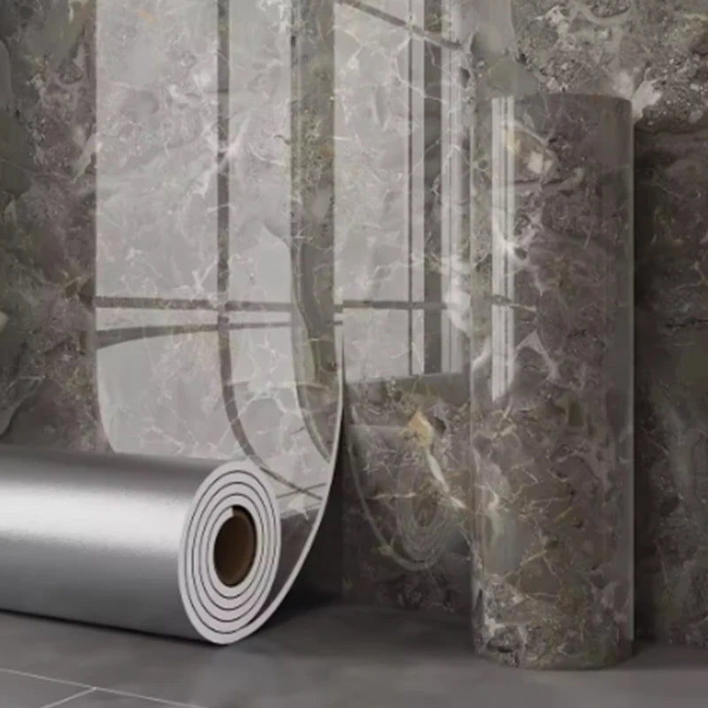 Thick marble-patterned foam wallpaper roll by Corporación Turística, showing textured marble design in neutral tones.