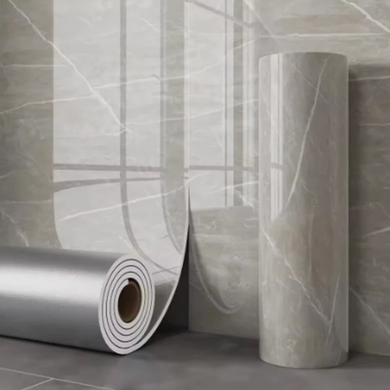 Thick foam marble wallpaper roll from Corporación Turística featuring a realistic gray marble pattern on a white background.
