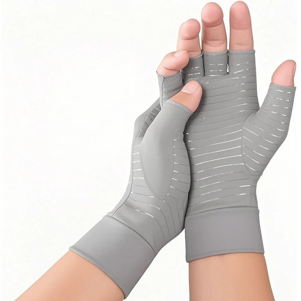 Pair of light gray copper arthritis gloves from Corporación Turística designed to help relieve joint pain and improve comfort.