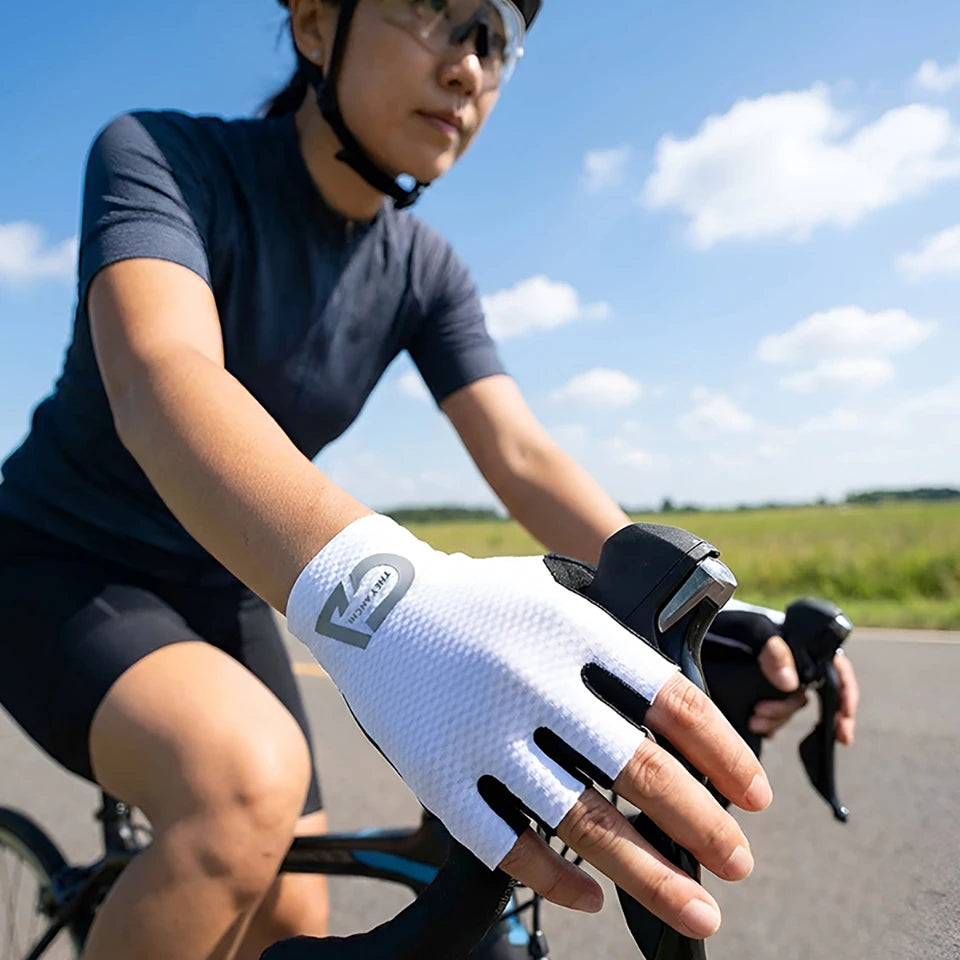 Guantes Ciclismo GTUBIKE Medio Dedo Antichoque Verano Transpirables - Corporación Turística